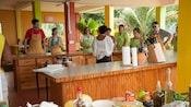 Guests taking a cooking class in Roseau, Dominica