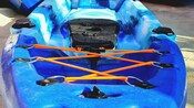 An open, double person hard shell kayak