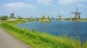 Rows of windmills along the canals of Kinderdijk in Holland