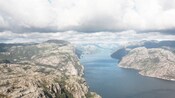 A large body of water running through a mountainous landscape