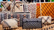 A collection of handcrafted and woven Fijian purses and bags