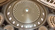 An ornate domed ceiling inside the Basilica of the Assumption of Our Lady in Mosta, Malta