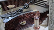 A chain rope barrier above the Fountain of Gandara