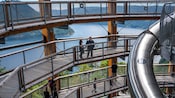 The interior of the Malahat Skywalk featuring walkways wrapped around the building surrounding a metal slide