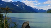 Chilkoot Lake surrounded by snowcapped mountains near Skagway, Alaska