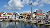 People enjoying the waterfront attractions of Skagenkaien in Stavanger, Norway