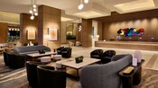The lobby of the Hyatt Regency Time Square featuring a seating area near the front desk  