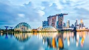 Gardens by the Bay and the Marina Bay Sands Singapore Hotel at night