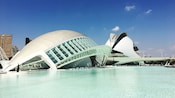 The City of Arts and Sciences in Valencia, Spain reveals a complex of futuristic, curvilinear architecture near a body of water