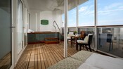 A jacuzzi with an ocean view at Senses Spa and Salon on board a Disney ship 