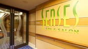 A sign reads 'Senses Spa and Salon' near the doors to the spa