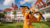 Pluto posing in the courtyard at Disney's Grand Floridian Resort