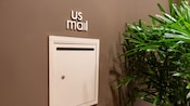 A secure US Mail drop box built into a wall