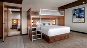 A JW Marriott Anaheim Resort Family Bunk Bed Suite with 2 rooms, a bed, a bunk bed and 2 side tables