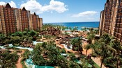 Aulani, Disney Vacation Club Villas, Ko Olina, Hawai`i A building at Aulani overlooking a landscaped pool area