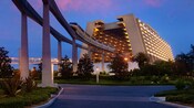 The monorail passing by Disney's Contemporary Resort at night