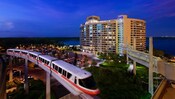 A monorail passing in front of Bay Lake Tower at Disney's Contemporary Resort