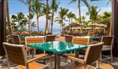 Ulu Café at Aulani Resort features an outdoor patio with a beach view