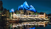 The Forbidden Mountain of Happily Everest After, illuminated at night