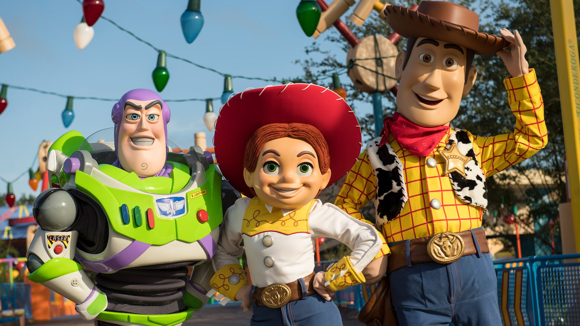 Buzz Lightyear, Jessie and Woody stand together on the streets of Toy Story...