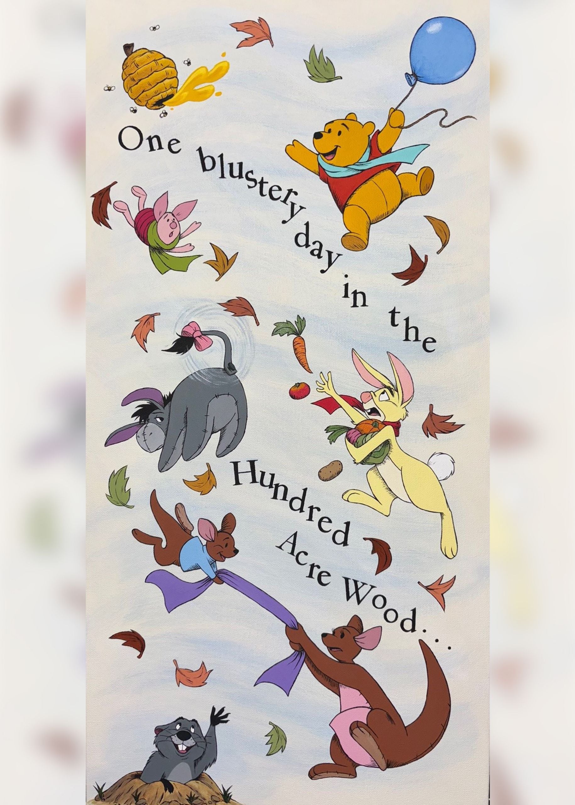 A piece of art depicts characters from the Disney animated film, The Many Adventures of Winnie the Pooh
