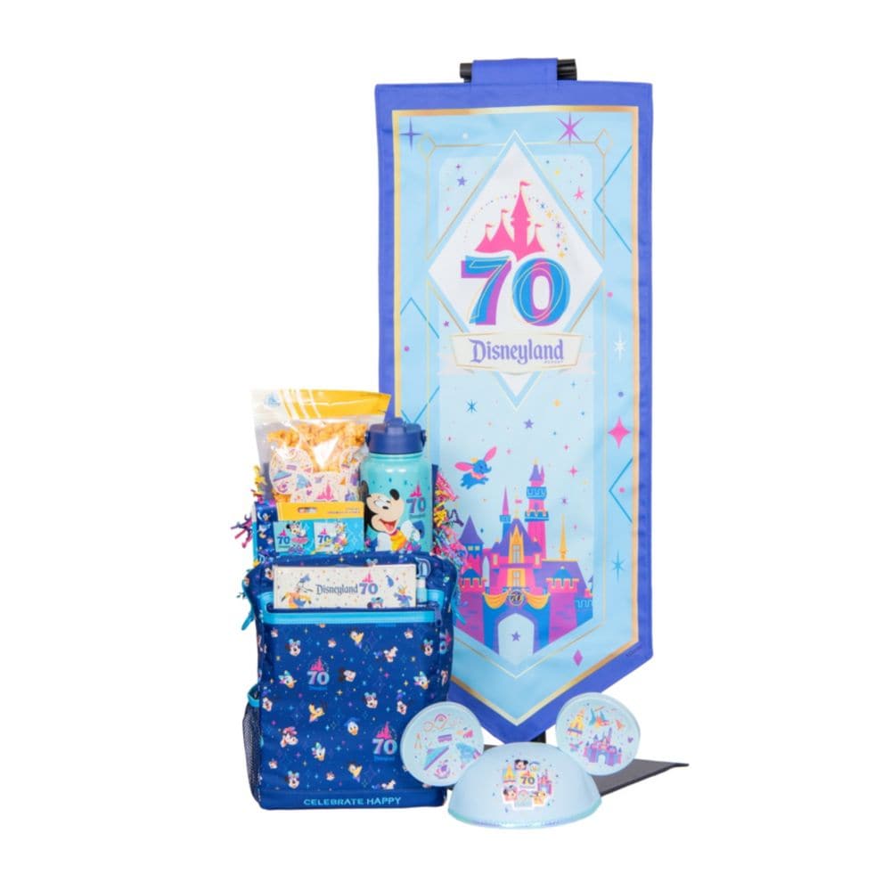 A Disneyland Resort 70th Celebration welcome basket, Mickey Mouse ear hat and banner featuring Sleeping Beauty Castle