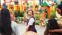 A Cast Member leads a family on a tour at Toy Story Land in Disney’s Hollywood Studios at Walt Disney World Resort