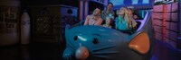 A family experiences the gigantic kitchen in Remy’s Ratatouille Adventure