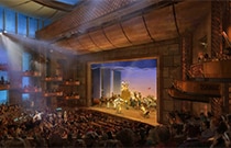 Realistic rendering of stage production at a large theater auditorium with thousands in audience