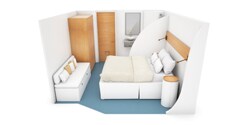 A model of a standard room, featuring a bed and small sitting module A model of a standard room, featuring a bed and small sitting module