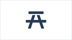 An icon of a picnic table