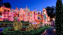 The Its a small world attraction at Disneyland park decorated for the holidays