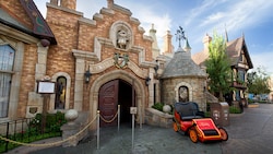 A motorcar waits at the entrance to Mr. Toad's Wild Ride in Disneyland Park