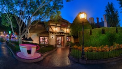 A whimsical tea cup leading the way to the entrance of Mad Hatter in Fantasyland at Disneyland Park