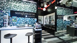 The Sunglass Icon counter sits beneath disco balls