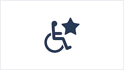 An icon of a person in a wheelchair moving toward a star