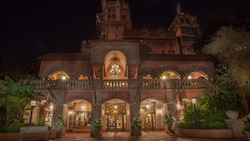 Exterior of the Tower Shop at Disney's Hollywood Studios, lit up at night