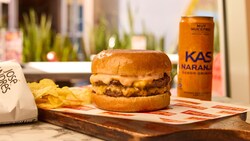 The Pepe Burger, José's Chips and a Kas Orange Soda from Pepe by José Andrés	