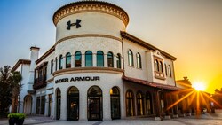 A large building with a sign that says ‘Under Armour’