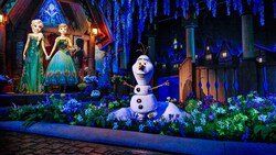 Elsa, Anna and Olaf on the Frozen Ever After attraction