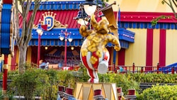 A statue of a Pink Elephant from 'Dumbo', painted like a popcorn bucket