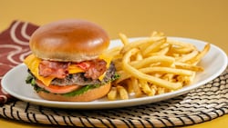 A Bacon Cheeseburger with fries from Harambe Market at Disney’s Animal Kingdom theme park