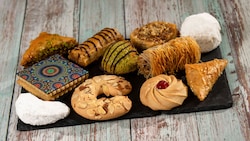 A platter of assorted cookies and pastries from Oasis Sweets & Sips at Epcot