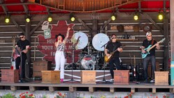 The band Gabie Country Band performing at the Canada Mill Stage in Epcot
