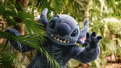 Stitch peeking out from the bushes