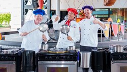 The Jammin’ Chefs holding pots and drumsticks