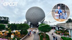 A smiling family of 4 at the Photo Pass Super Zoom location near Spaceship Earth at Epcot