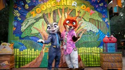 Judy Hopps and Nick Wilde from Zootopia posing at the Zoogether Day Gathering Spot in Disney's Animal Kingdom theme park