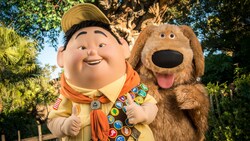 Dug and Russell from the Pixar Animation Studios film ‘Up’ posing at Discovery Island Trails in Disney's Animal Kingdom theme park