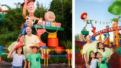 Una Disney Magic Shot con un soldado de juguete sujeto a un paracaídas, con una pareja y sus niños en Toy Story Land, en Disney’s Hollywood Studios